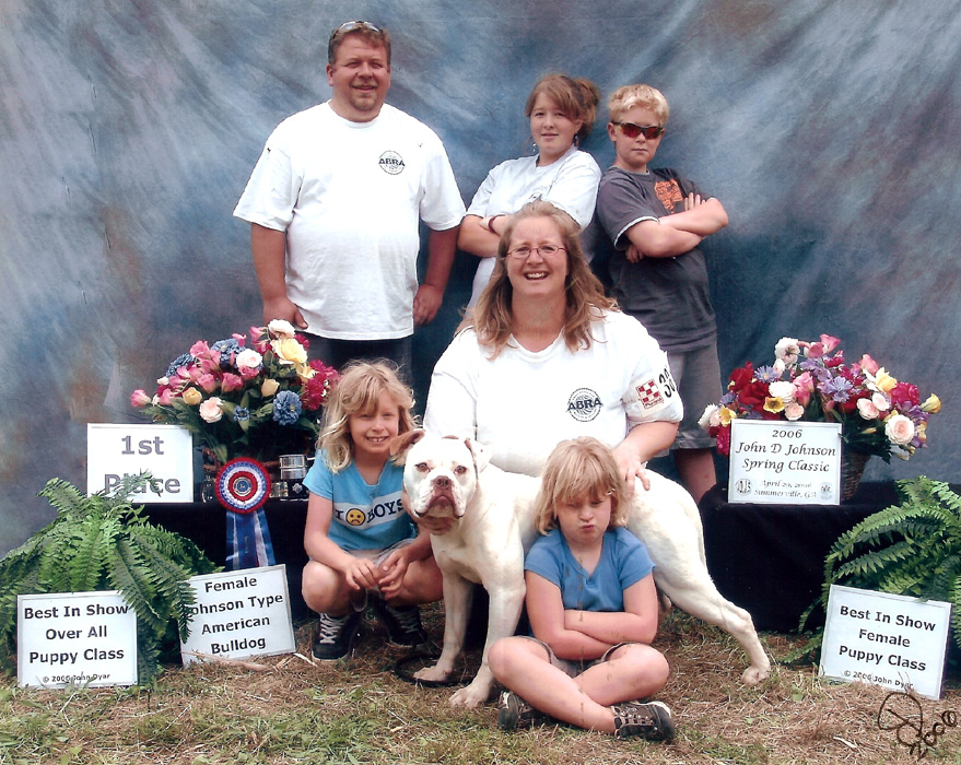 The Rose family with their Best in Show American Bulldog at the 2006 John D. Johnson Spring Classic